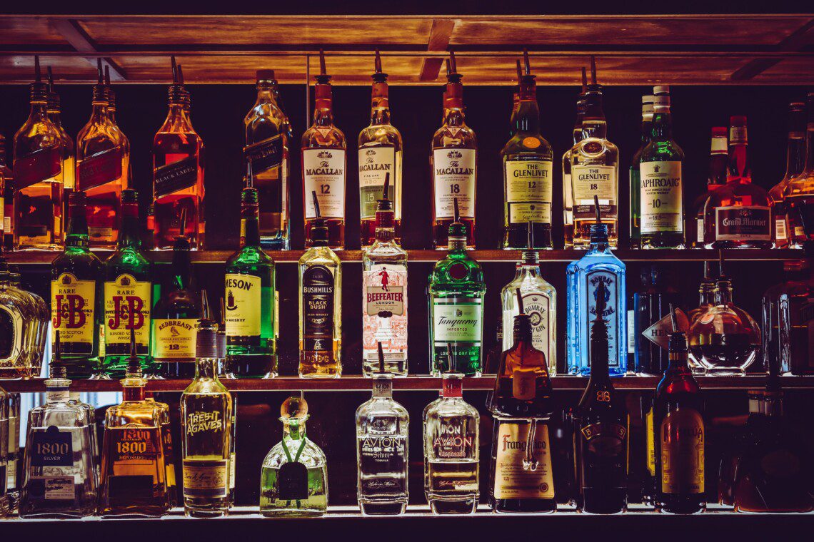Whiskies on bar shelves